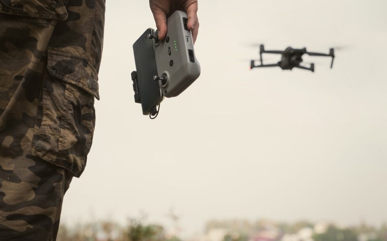 A,Man,In,A,Military,Uniform,With,A,Uav,Control